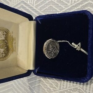 Elegant Silver Commemorative Brooch with Chain